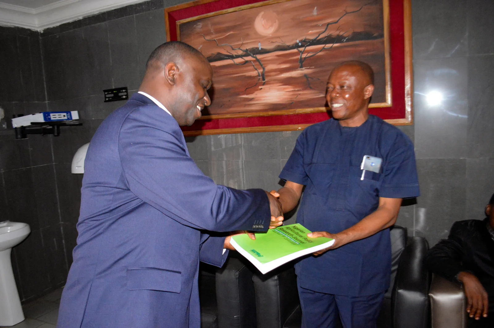 Presentation-of-Nigerian-Agricultural-Policy-Researc-Journal-copies-to-Imo-State-Government-via-the-Commissioner-for-Agric